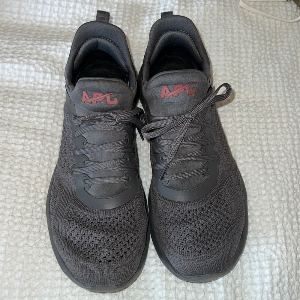 Size 8 APL shoes in a dark charcoal gray
